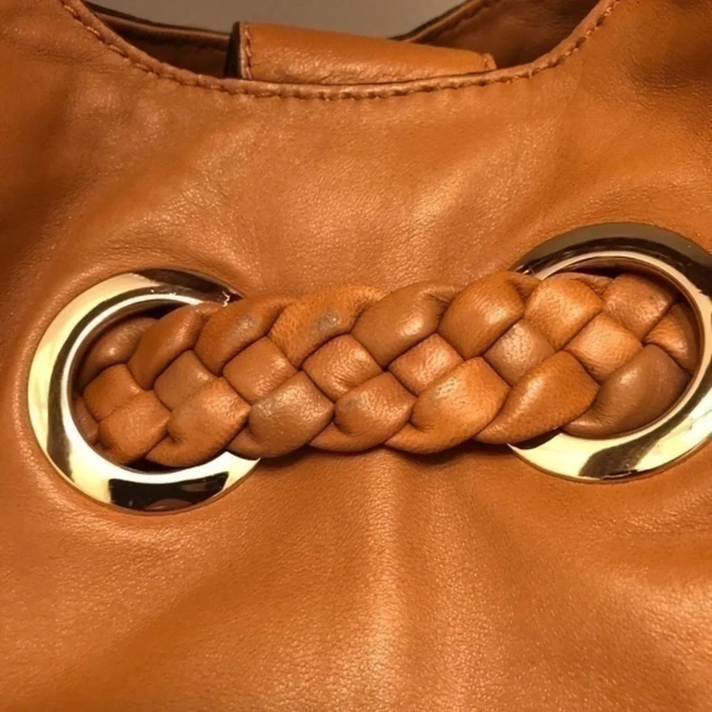 Michael kors brown leather grommet tassel bag